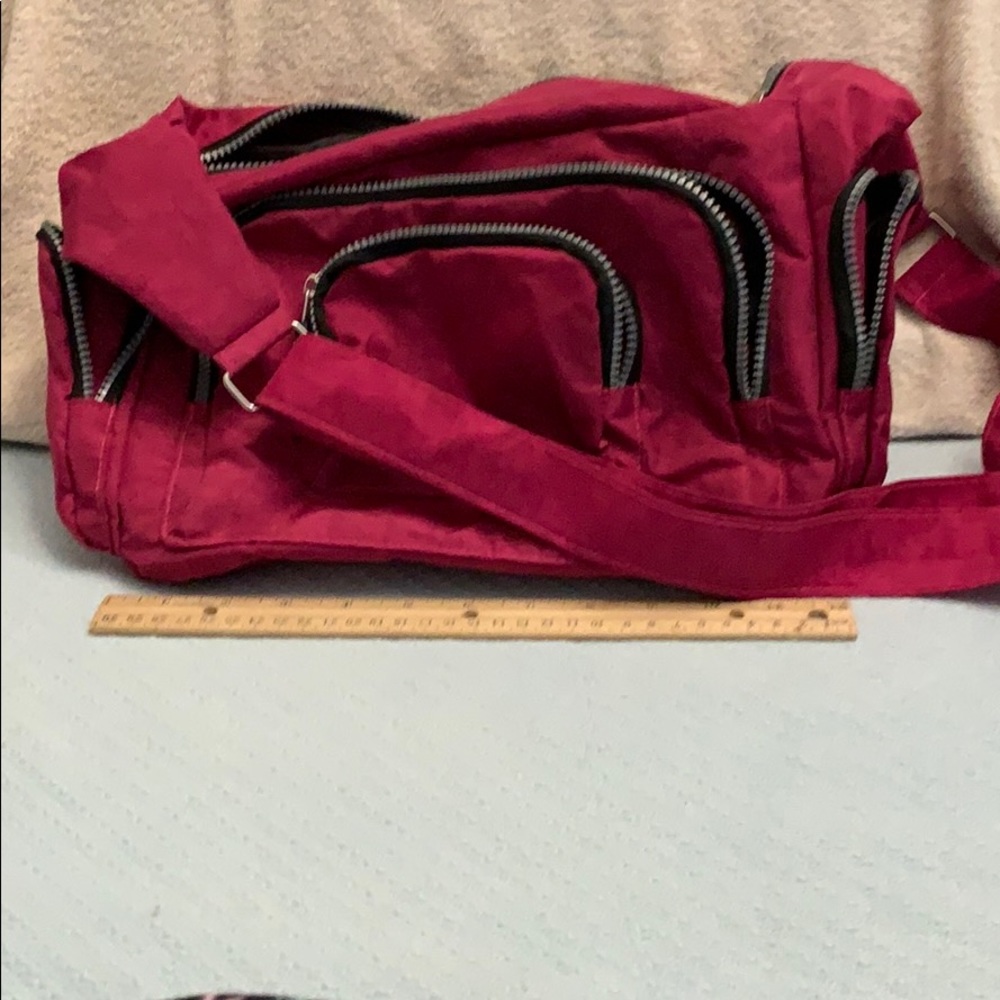 Lightweight nylon over the shoulder purse.